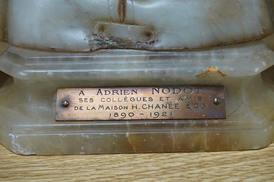 After Giuseppe Bessi (1857-1922) carved alabaster bust of Joan of Arc, plaque reads ‘A Adrien Nodot ses collègues et amis de La Maison H. Chanée & Cie 1890-1921’, 30cm. Condition - fair to good
